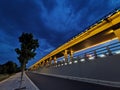 Small trees, overpasses, and lights